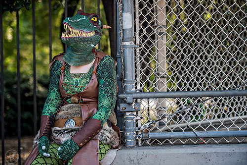 Michelle Allen waits for the start of the annual DragonCon Parade in Atlanta on Saturday. 