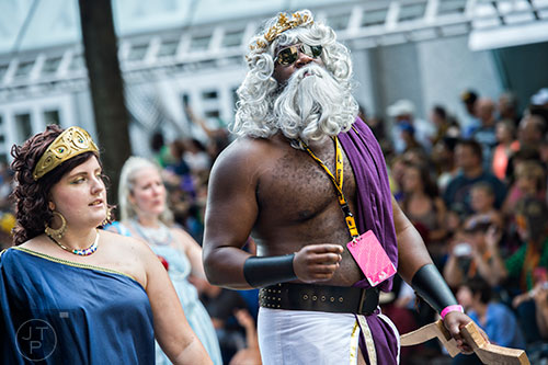 Marcel Moore struts down the street as a Greek god during the annual DragonCon Parade in Atlanta on Saturday, September 5, 2015.