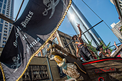Dressed as a pirate, Lorenzo Rodriguez rides a giant ship down the street during the annual DragonCon Parade in Atlanta on Saturday, September 5, 2015.