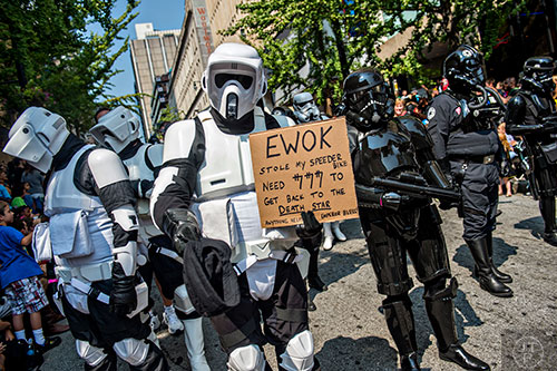Even scout troopers have a sense of humor as the annual DragonCon Parade marches down the street in Atlanta on Saturday. 