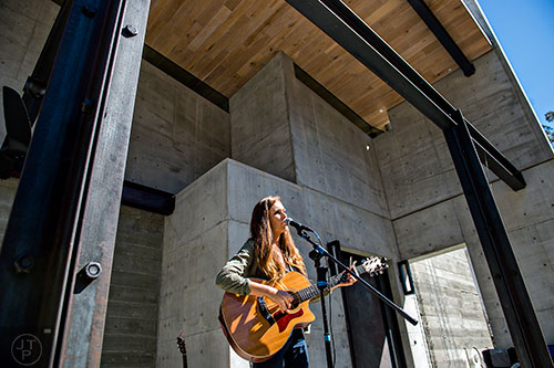 Sydney Rhame performs during the Oakhurst Porch Fest on Sunday.