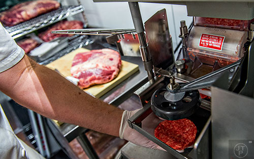 Freshly ground beef patties inside the kitchen at H&F Burger at Ponce City Market.