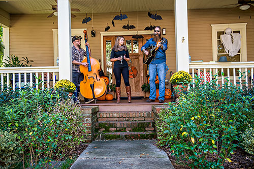 Nine Years Apart performs during the Oakhurst Porch Fest on Sunday.