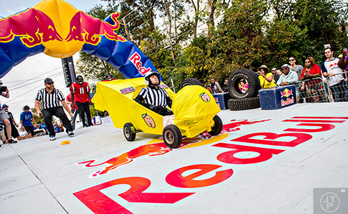 The 92.9 The Game vehicle takes off from the starting ramp during the Red Bull Soap Box Derby in Atlanta on Saturday, October 24, 2015. 