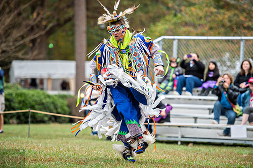 Jacob Gober dances during the Indian Festival & Pow Wow at Stone Mountain Park on Saturday, October 31, 2015. 