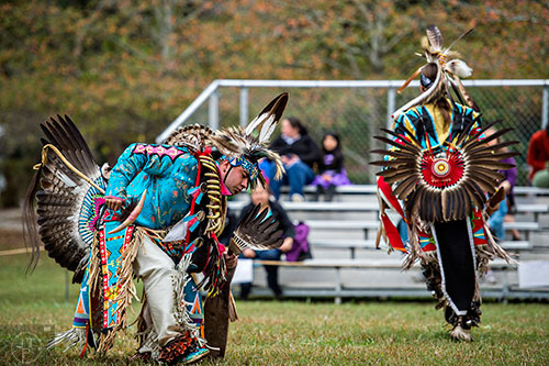 Charles Backus (left) dances during the Indian Festival & Pow Wow at Stone Mountain Park on Saturday, October 31, 2015. 