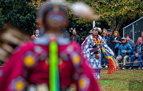 Donna Delgadillo (right) dances during the Indian Festival & Pow Wow at Stone Mountain Park on Saturday, October 31, 2015. 