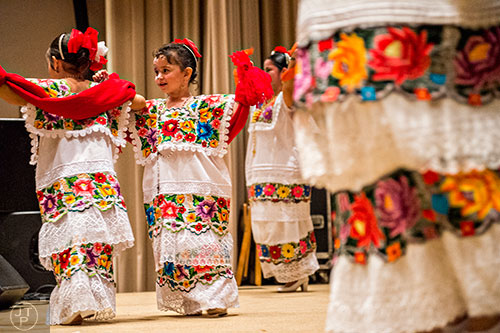 Lucia Lev (center) dances on stage during the Dia De Muertos, or Day of the Dead, Festival at the Atlanta History Center on Sunday, November 1, 2015. 