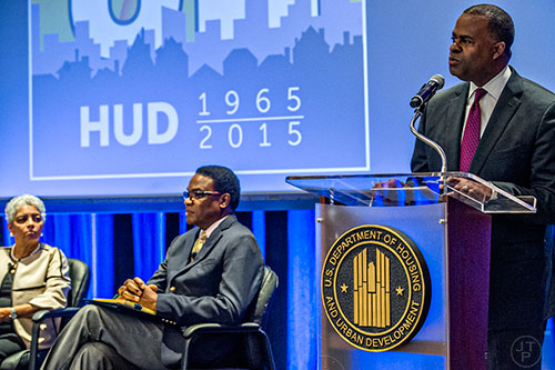 Atlanta Mayor Kasim Reed (right) shares a rare stage with former Atlanta Mayor Shirley Franklin (left) as he introduces a panel discussion at the Center for Civil and Human Rights in Atlanta on Wednesday, November 4, 2015.   