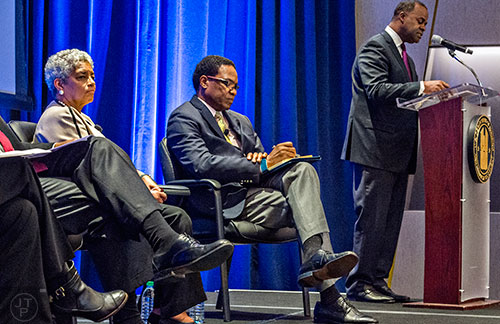 Former Atlanta Mayor Shirley Franklin (left) shares a rare stage with current Atlanta Mayor Kasim Reed (right) as he introduces a panel discussion at the Center for Civil and Human Rights in Atlanta on Wednesday, November 4, 2015.   