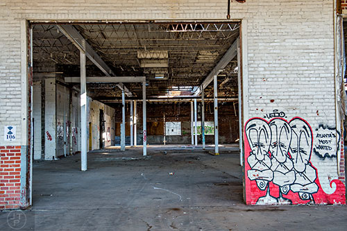 A large bay door gives a glimpse inside the Atlanta Dairies property off of Memorial Dr. in downtown.