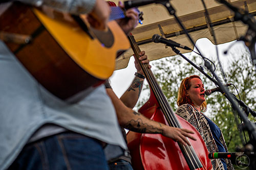 Anna Kline (right) performs on stage with Grits & Soul during the Cabbagetown Chomp & Stomp in Atlanta on Saturday, November 7, 2015.