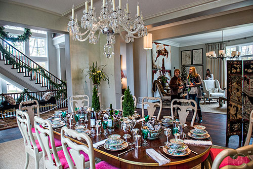 Missy Dyches (right) and her mother-in-law Faye look in the dining room inside the 2015 Home for the Holidays Designer Showhouse located at 1150 West Garmon Rd. in Atlanta on Saturday, November 21, 2015. 