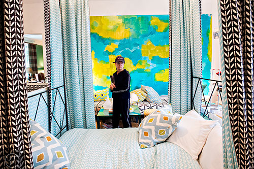 Susan Bolch checks out the four poster bed in one of the children's rooms inside the 2015 Home for the Holidays Designer Showhouse located at 1150 West Garmon Rd. in Atlanta on Saturday, November 21, 2015. 