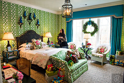 Tonya Lacourse checks out one of the guest suites inside the 2015 Home for the Holidays Designer Showhouse located at 1150 West Garmon Rd. in Atlanta on Saturday, November 21, 2015. 