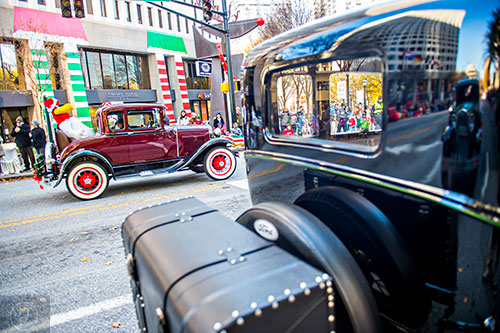 A stuffed Foghorn Leghorn doll sits in the back of John Pace's Model A during the 2015 Children's Christmas Parade in Atlanta on Saturday, December 5, 2015. 