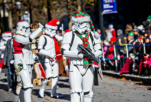 Ryan Licht (center) and other members of the 501st Legion march down Peachtree St. during the 2015 Children's Christmas Parade in Atlanta on Saturday, December 5, 2015. 