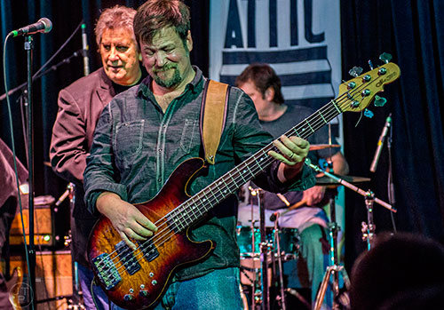 Atlanta Rhythm Section bassist Justin Senker performs on stage at Eddie's Attic in Decatur on Friday, December 11, 2015.  