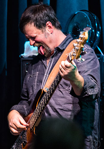 Atlanta Rhythm Section bassist Justin Senker performs on stage at Eddie's Attic in Decatur on Friday, December 11, 2015. 