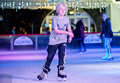 Will Garstka ice skates at the Southwest Rink at Park Tavern in Atlanta on Saturday, December 26, 2015. 