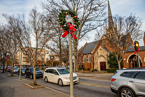 Wreaths decorate the lamp posts along Church St. in Decatur.