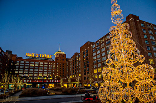 Photo: Jonathan Phillips   The main Christmas tree made of metal balls and lights sits near the North Ave. entrance to Ponce City Market.