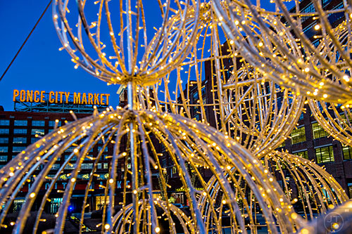 The main Christmas tree made of metal balls and lights sits near the North Ave. entrance to Ponce City Market.