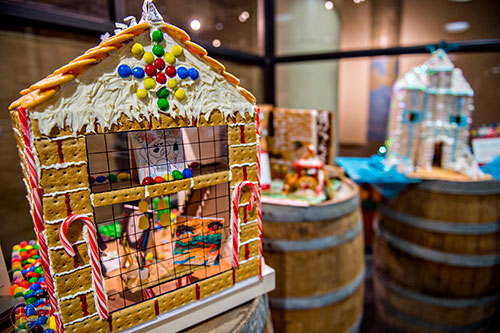 Gingerbread houses sit on display on the second floor of Ponce City Market.