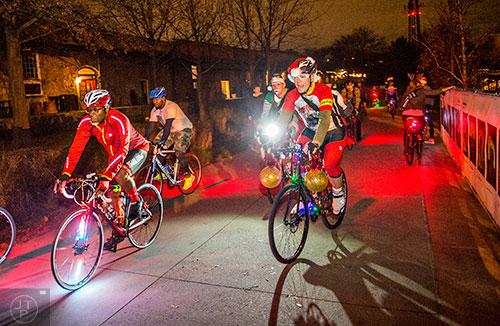 Around 50 cyclists head up the Atlanta Beltline's Eastside Trail for the annual Atlanta Christmas Ride on Wednesday evening.