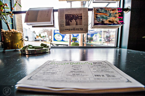 Grab something to read while looking at the menu at Bread & Butterfly in Inman Park.