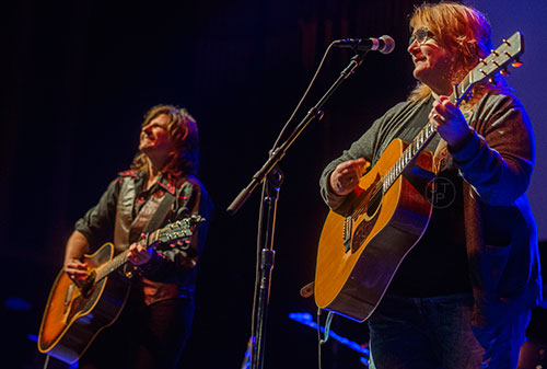 The Indigo Girls' Emily Saliers (right) and Amy Ray perform on stage during a tribute to the late Alex Cooley at the Tabernacle in Atlanta on Saturday, January 9, 2016. 