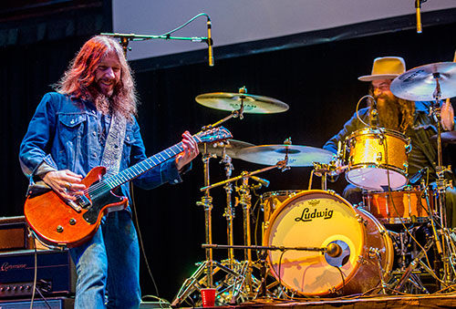 Blackberry Smoke's Charlie Starr (left) and Brit Turner perform on stage during a tribute to the late Alex Cooley at the Tabernacle in Atlanta on Saturday, January 9, 2016.