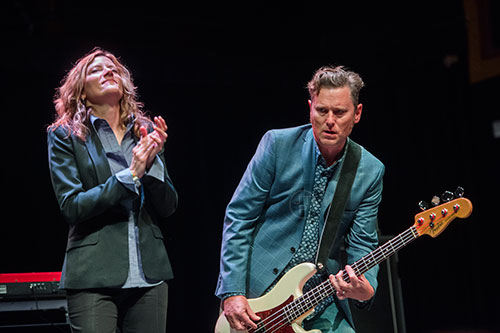 Michelle Malone (left) and Tim Nielsen perform on stage during a tribute to the late Alex Cooley at the Tabernacle in Atlanta on Saturday, January 9, 2016. 