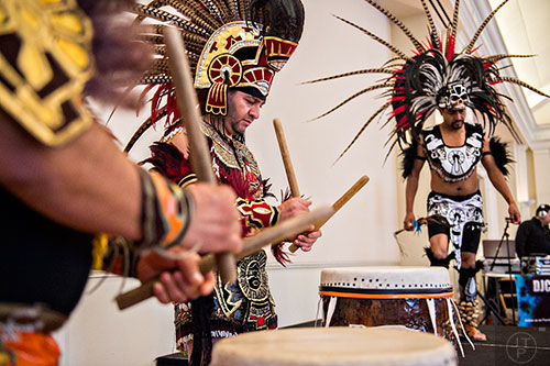 Luis Gutierrez (left) and Juan Villagomez perform traditional Aztec drumming and dancing during the Dia de los Reyes, or Three Kings Day, celebration at the Atlanta History Center on Sunday, January 10, 2016. 