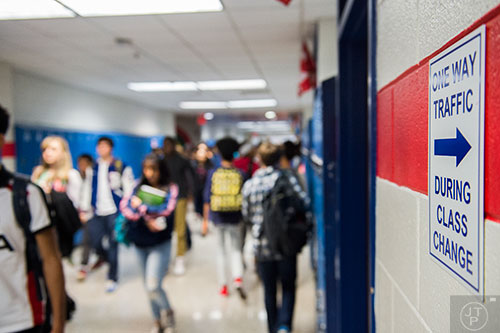 Students fill the congested hallways during a class change at Riverwood High School in Atlanta on Tuesday, January 12, 2016. 