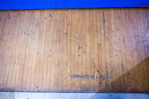 Flooring in the auxiliary gym is in need of floor repairs at Riverwood High School in Atlanta on Tuesday, January 12, 2016. 