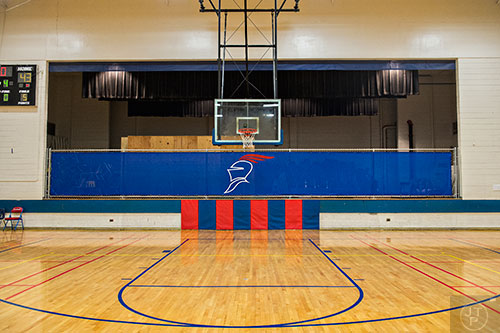 A fence blocks the stage in the main gym, now used for storage, at Riverwood High School in Atlanta on Tuesday, January 12, 2016. 