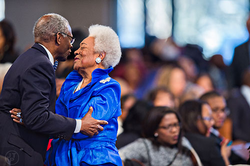Naomi King (right) hugs Lawrence Carter before the 48th Martin Luther King Jr. Annual Commemorative Service at Ebenezer Baptist Church in Atlanta on Monday, January 18, 2016. 