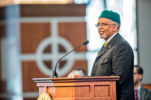 Imam Plemon T. El-Amin reads from the Quran during the 48th Martin Luther King Jr. Annual Commemorative Service at Ebenezer Baptist Church in Atlanta on Monday, January 18, 2016. 