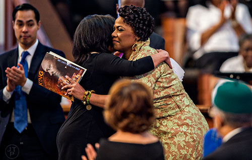 Dr. Bernice King (right) hugs Goldie Taylor after addressing the crowd during the 48th Martin Luther King Jr. Annual Commemorative Service at Ebenezer Baptist Church in Atlanta on Monday, January 18, 2016. 