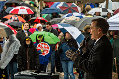 Pastor Mike Stone (right) speaks during a rally before the Georgia March for Life at Liberty Plaza across from the state capitol building in Atlanta on Friday, January 22, 2016.
