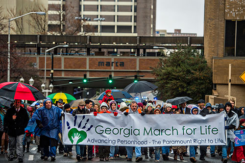 A couple hundred pro life supporters walk up Piedmont Ave. during the Georgia March for Life in Atlanta on Friday, January 22, 2016. 