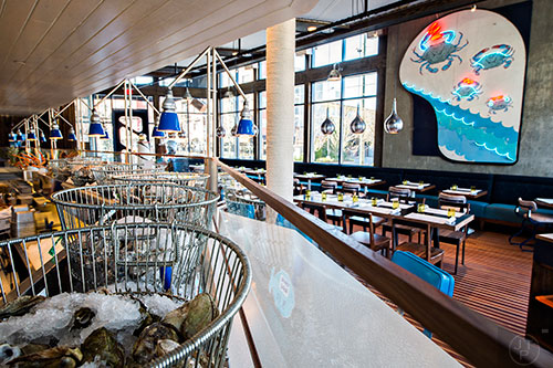 Fresh seafood adorns the ice along the bar area at BeetleCat in Atlanta.