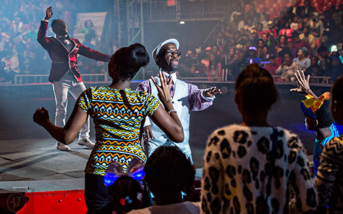 Zeke the Sidekick (center) dances with the crowd during the opening night of the UniverSoul Circus in Atlanta on Wednesday, February 3, 2016.