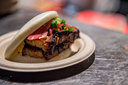 A roasted pork belly bun is just one of the dishes served during the Lunar New Year Celebration at Makan in Decatur on Saturday, February 6, 2016. 