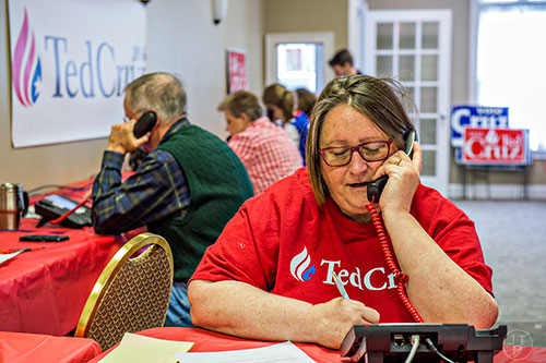 Denise Ognio (right) makes phone calls to voters at the Fayette County GOP building in Fayetteville on Monday, February 15, 2016. 