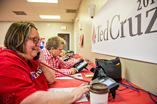Denise Ognio (left) makes phone calls to voters at the Fayette County GOP building in Fayetteville on Monday, February 15, 2016.