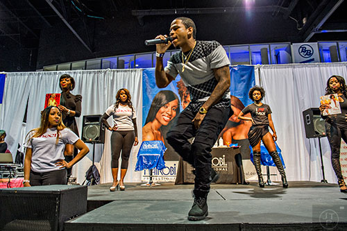 Vedo (center) performs during the Bronner Brothers International Beauty Show at the Georgia World Congress Center in Atlanta on Saturday, February 20, 2016.