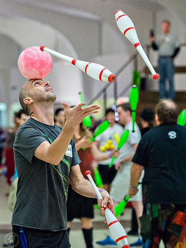 Roger Smith balances a ball on his head as he juggles during the 38th annual Groundhog Day Jugglers Festival at the Yaarab Shrine Center in Atlanta on Saturday, February 6, 2016.