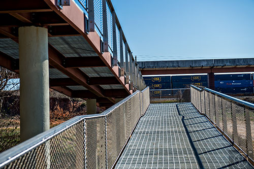 The Edgewood Avenue Bridge is completed and open with a ramp on one side and stairs on the other to connect to the Beltline.
